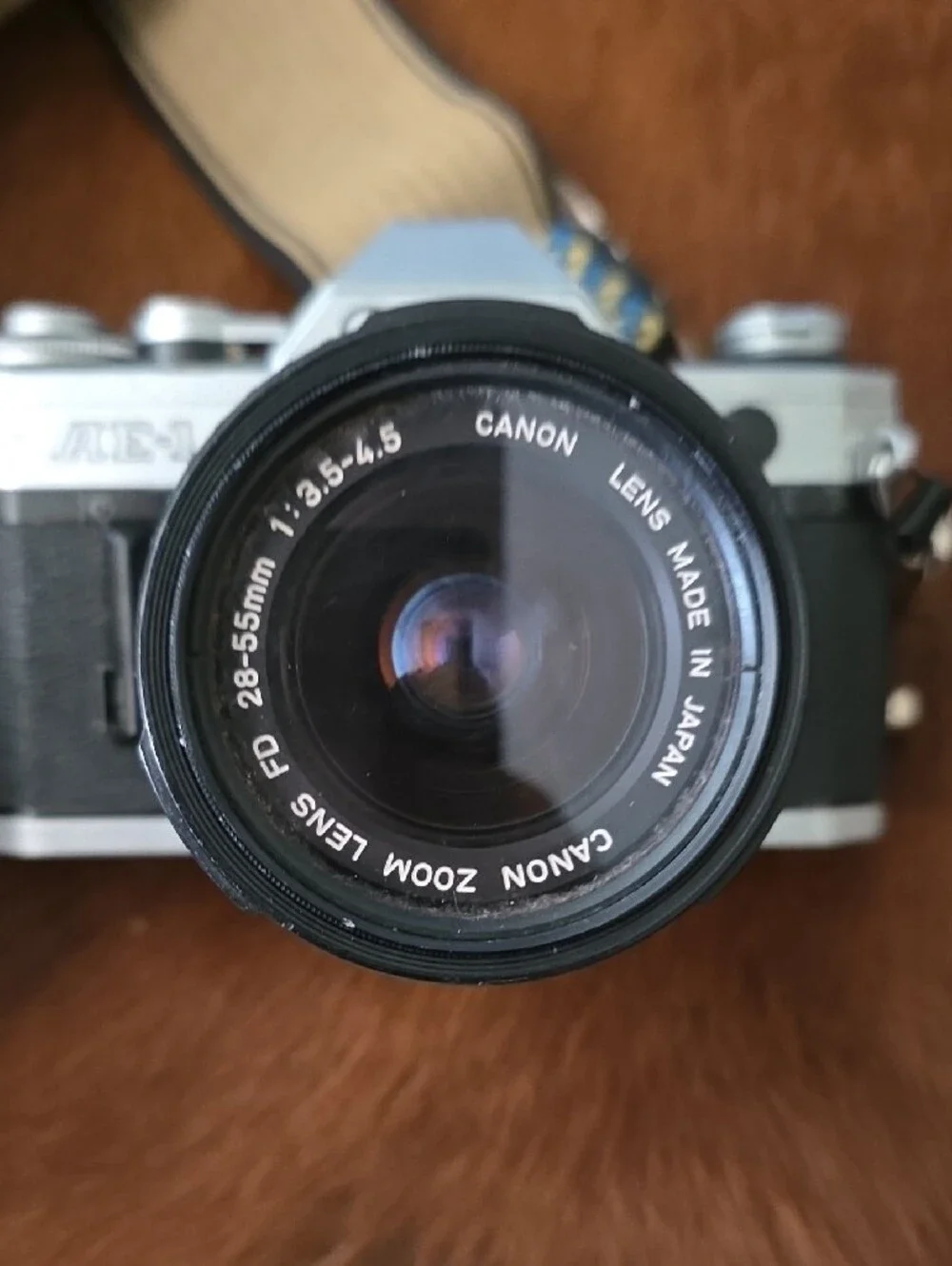 Canon 35mm Film Camera in Silver and Black with Tan Patterned Strap Vintage